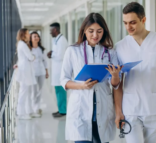 team-young-specialist-doctors-standing-corridor-hospital